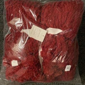 Brand new red Pom Pom blanket, Pottery Barn.